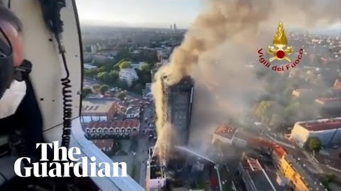 Flames engulf residential tower block in Milan