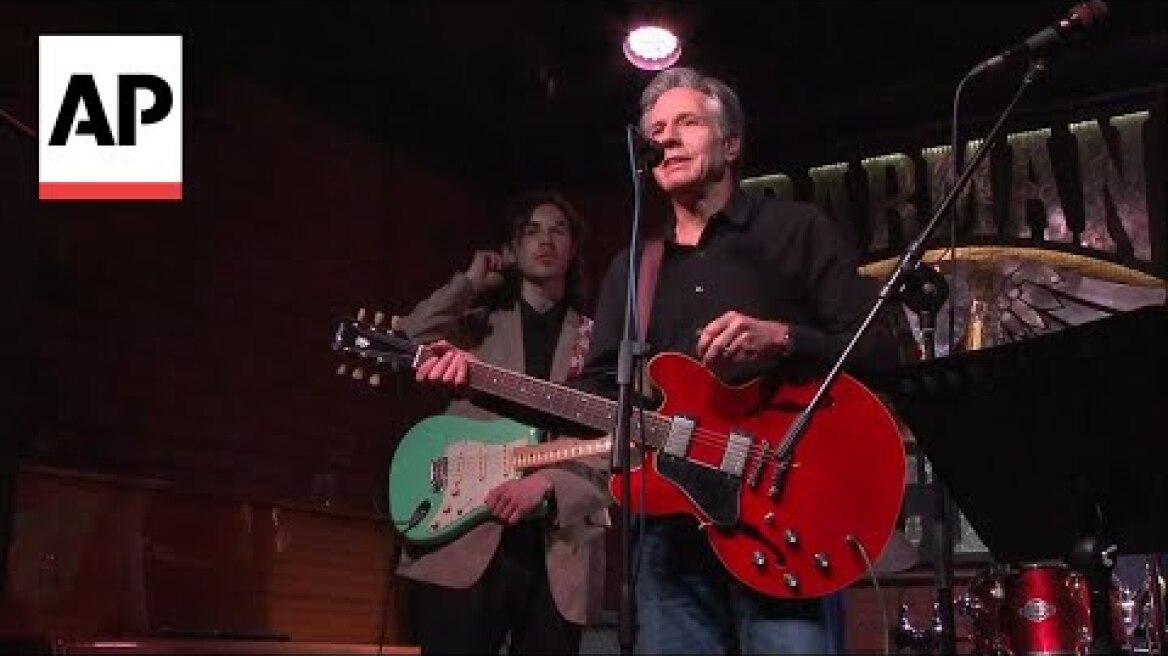 WATCH: Blinken sings, plays guitar at Kyiv night club in Ukraine