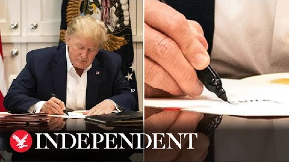Trump mocked for signing blank paper in ‘staged’ photos at Walter Reed