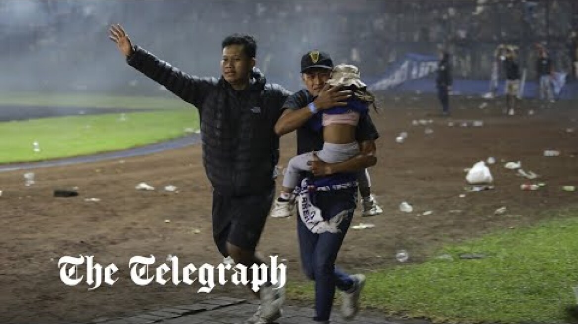 Indonesia football stampede: At least 174 people dead after violence at match