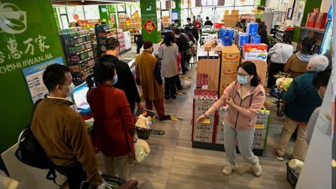 Panic buying grips Beijing supermarket after lockdown rumours