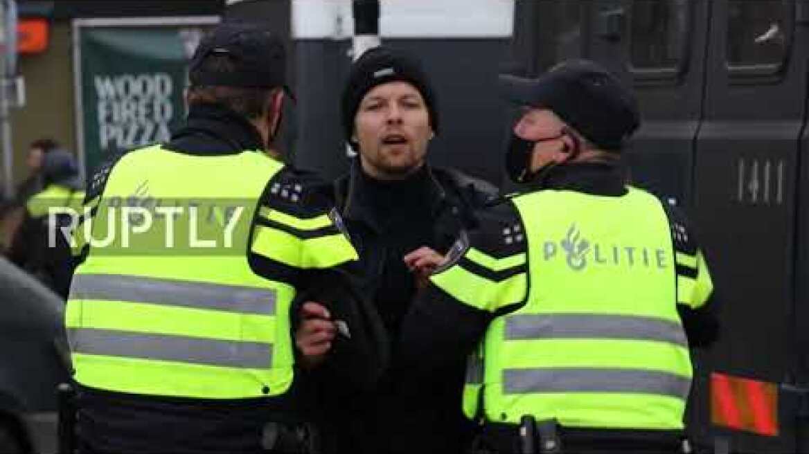 Netherlands: Police use water cannon to disperse COVID protest in Amsterdam