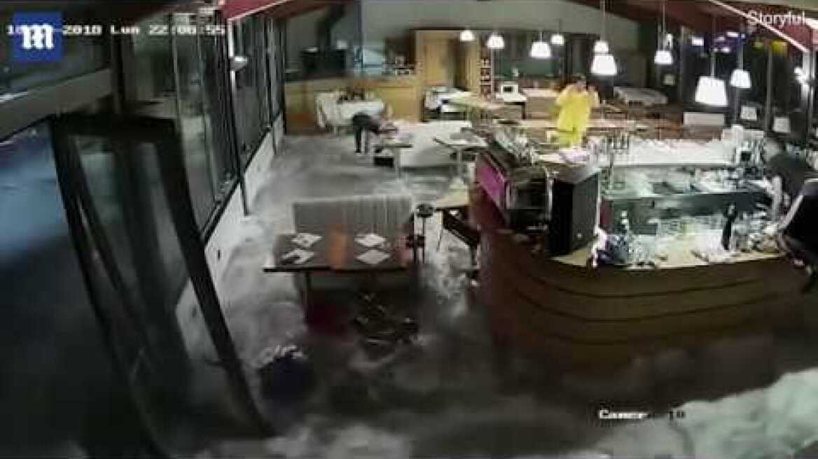 Wave crashes through windows of Italian restaurant in Arenzano