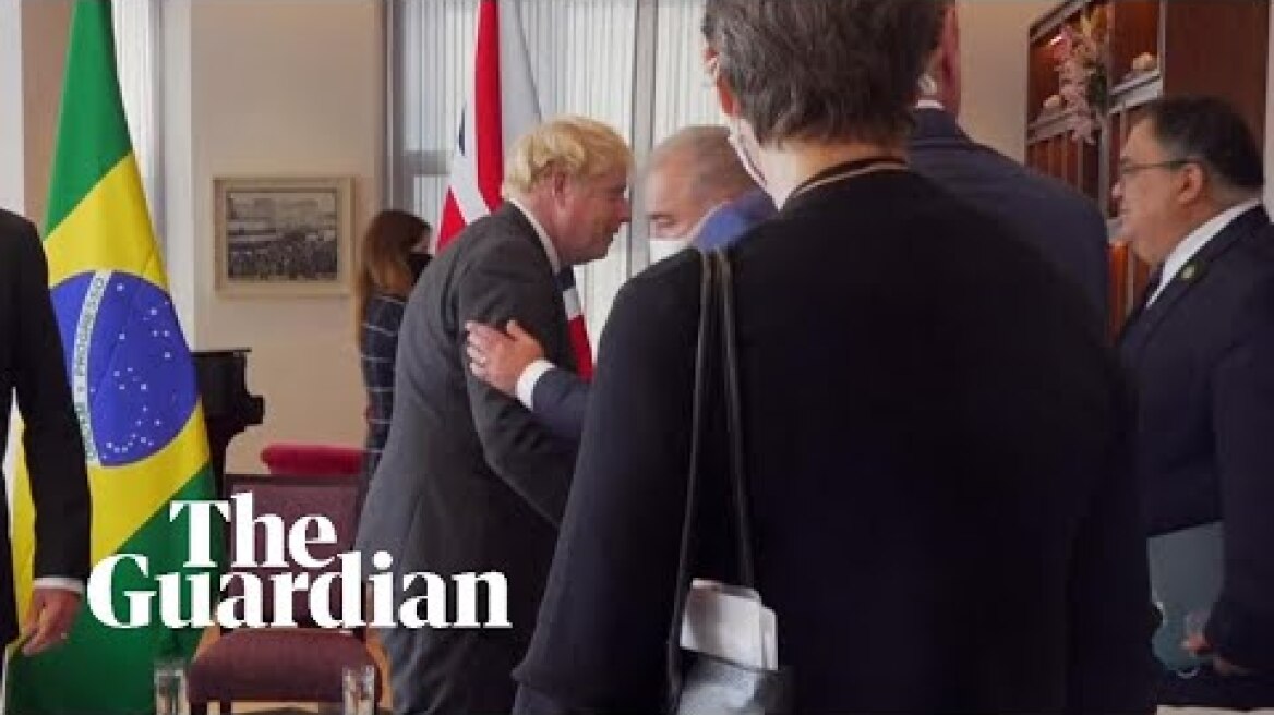 Brazil's health minister shakes hands with Boris Johnson before testing positive for Covid