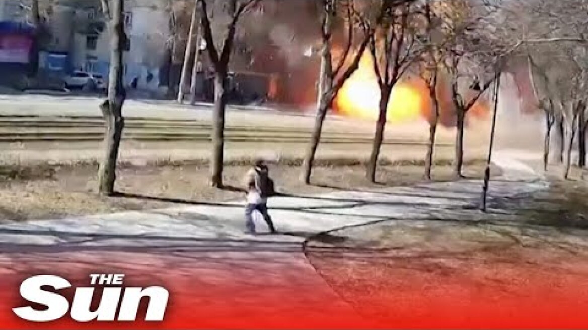 Moment missile strikes in Kyiv city centre as civilians flee