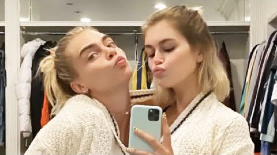 Cara Delevingne & Kaia Gerber Snuggle In 'Folklore' Cardigan