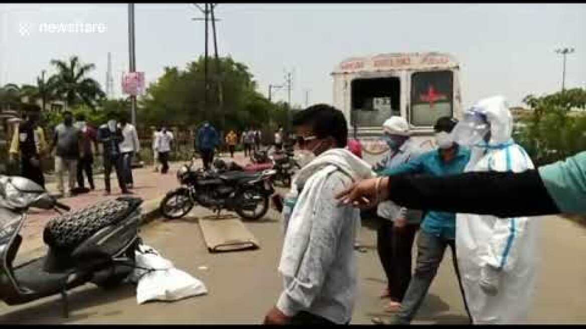 Body of COVID 19 victim falls out of ambulance in India's Madhya Pradesh