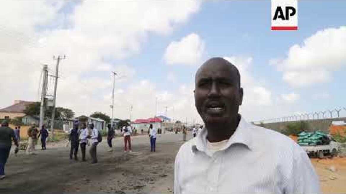 Aftermath of suicide attack on Italian military convoy in Somalia