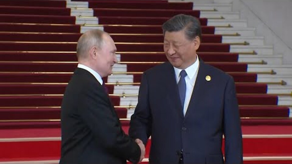 Vladimir Putin meets Xi Jinping in China ahead of Belt and Road Initiative forum | AFP