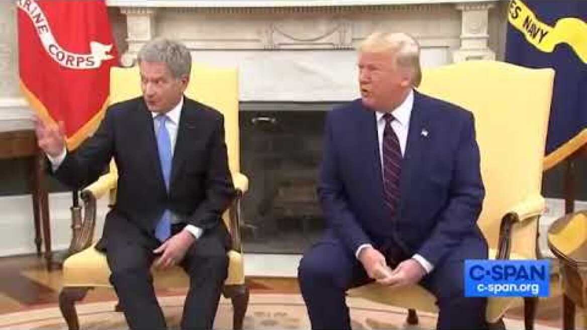 Watch the president of Finland‘s reaction to Donald Trump touching him