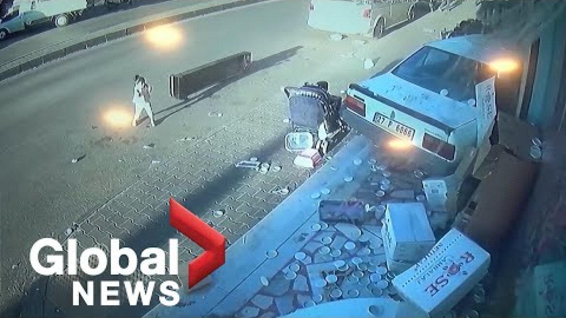 CCTV footage shows moment driver crashes into Turkish shop, narrowly missing children