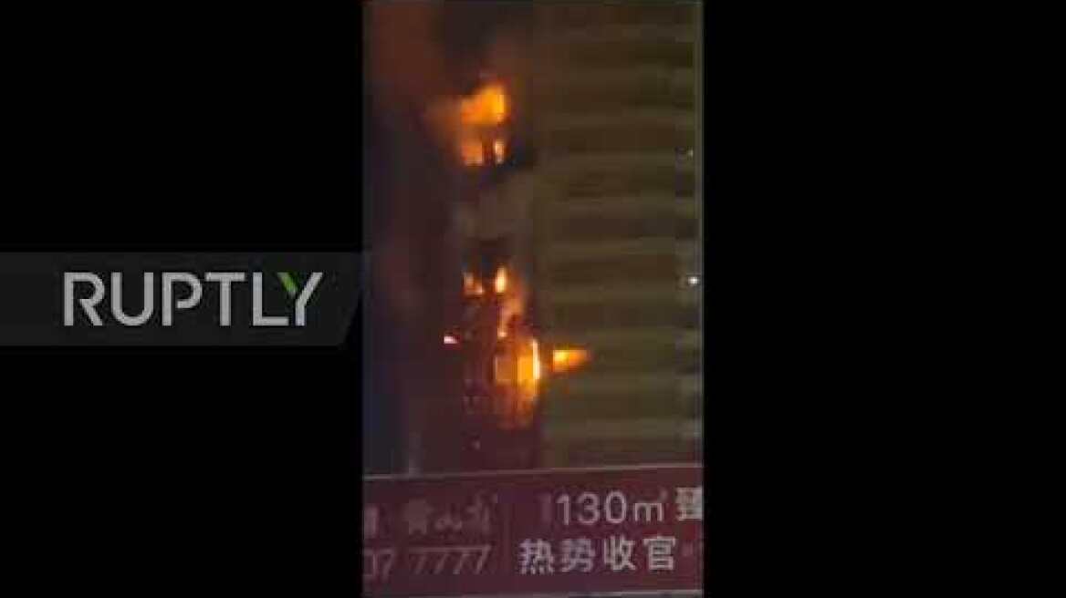 China: Fire breaks out in tower block