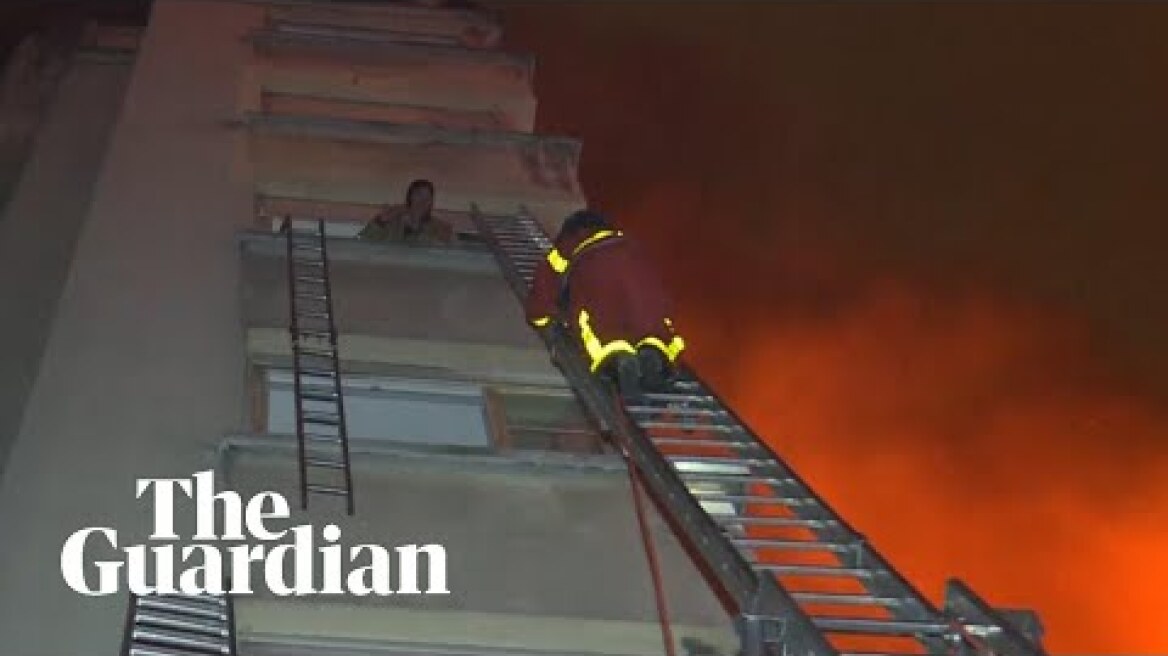 Woman detained after deadly apartment blaze in central Paris