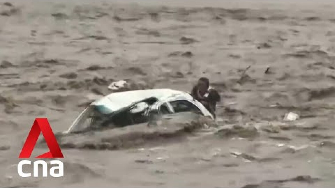 China floods: Dramatic rescue in Hebei, Beijing neighbourhoods submerged