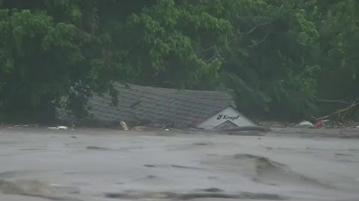 Floodwaters carry structure down Guadalupe River