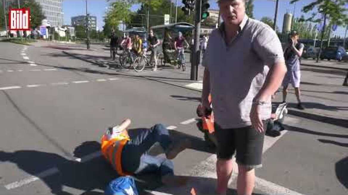 Attacke in München: Autofahrer ohrfeigt einen Klima Terroristen!