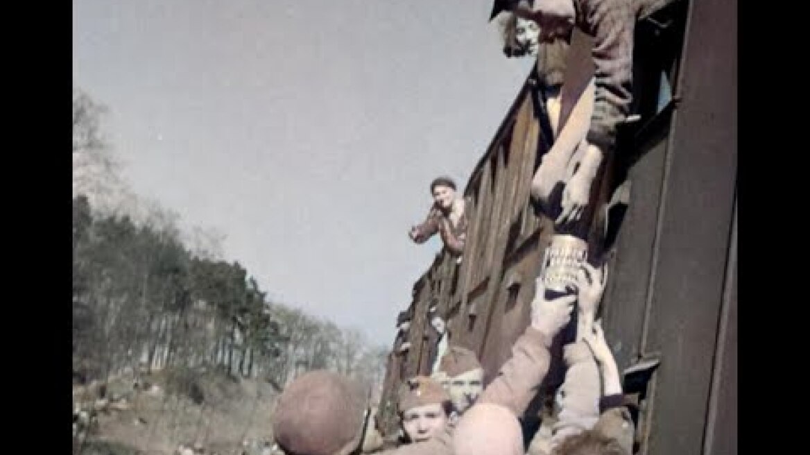 Farsleben Train, April 1945. US GIs record survivors at liberation site, Farsleben, Germany.