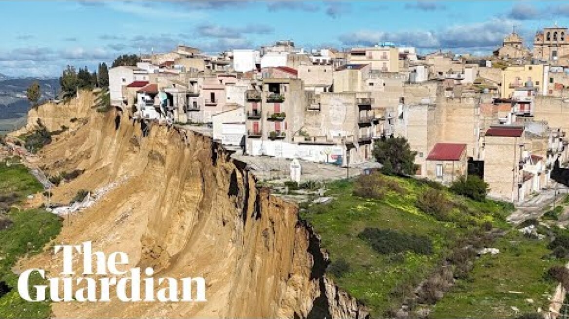 Houses and cars teeter on cliff edge after Sicilian landslide