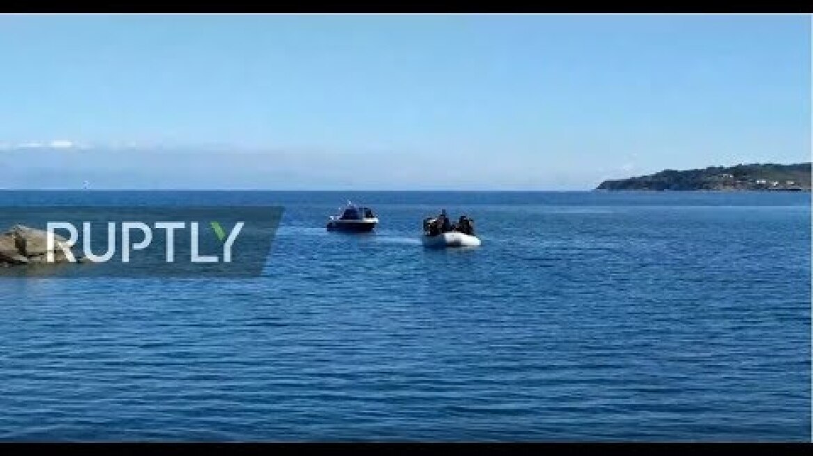 LIVE: Refugees come ashore on Lesbos as Turkey opens its borders