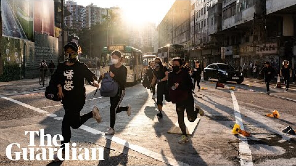 Hong Kong protests: student shot and man set on fire during clashes