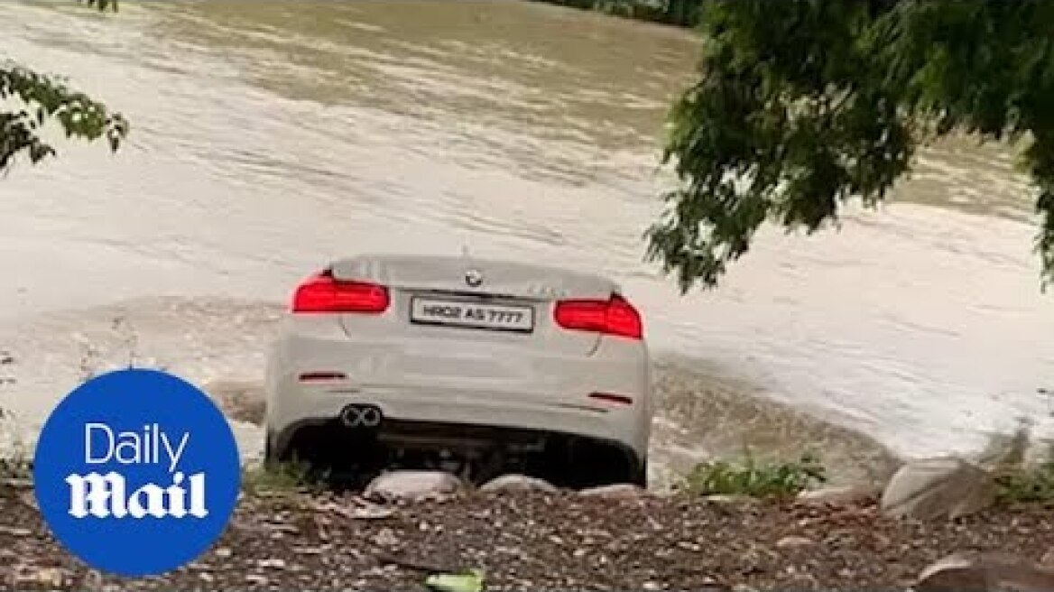 Man plunges BMW into a lake in a rage after he didn't get a Jaguar