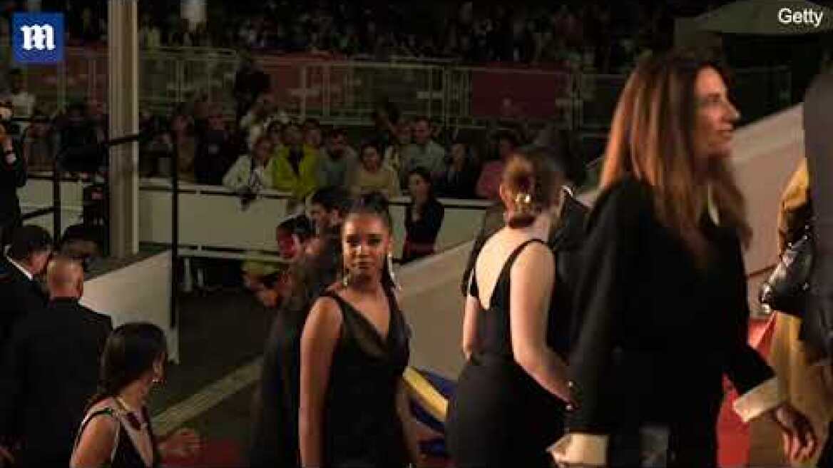 Video: Protester covers herself in fake blood on the red carpet of Cannes