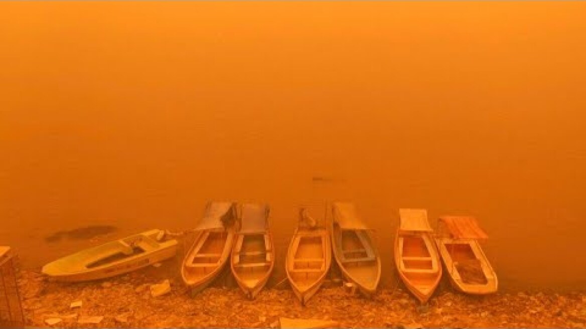 Thick sheet of orange dust blankets Iraq's capital Baghdad | AFP