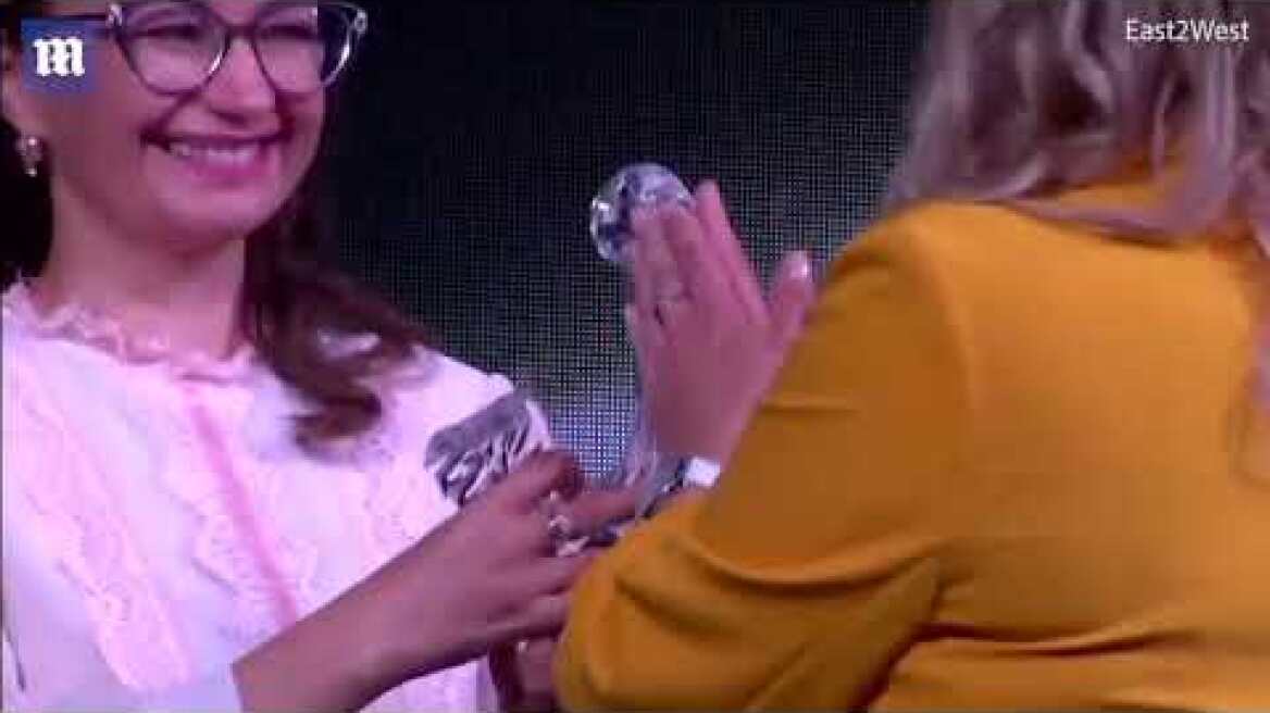 Teachers Made To Rub Very Odd-Looking Trophy At Awards Ceremony