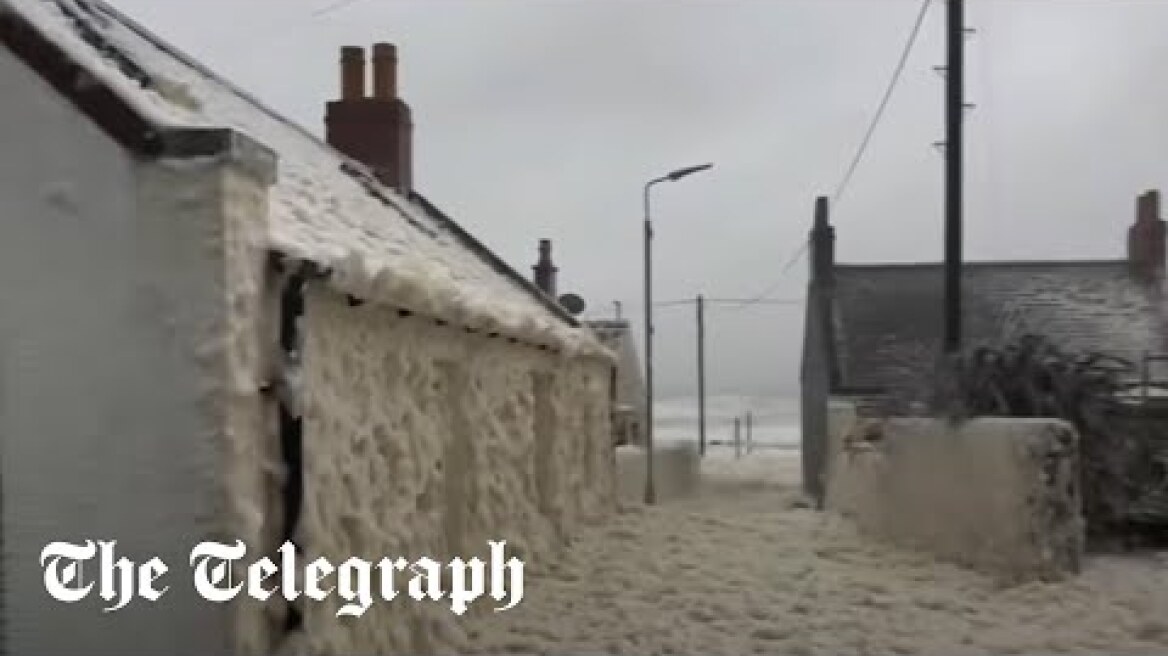 High winds whip up sea foam as Storm Babet batters Scotland