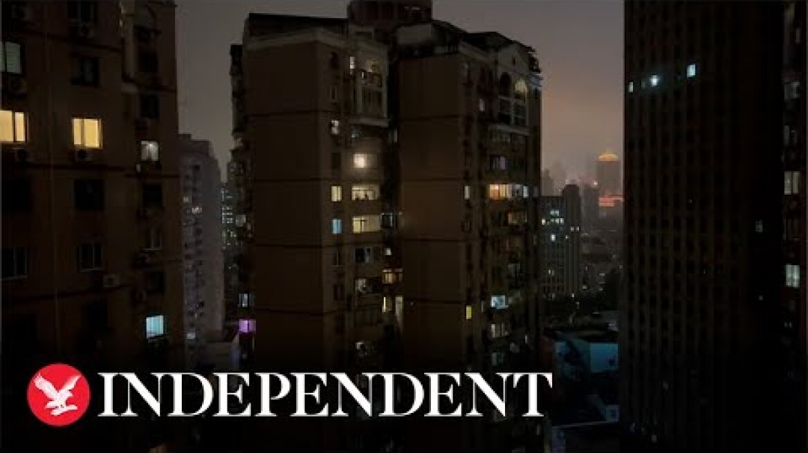 Shanghai residents protest strict lockdown by banging pots out their windows