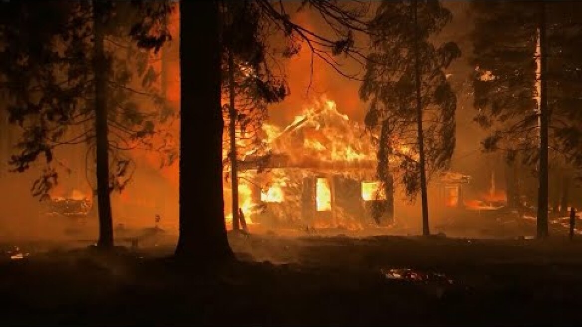 California's largest wildfire destroys multiple homes, forces tens of thousands to evacuate