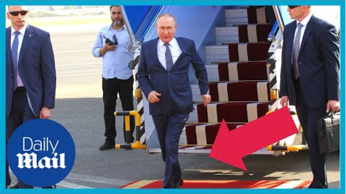 Putin can't walk: Watch him hobble along red carpet arriving in Iran
