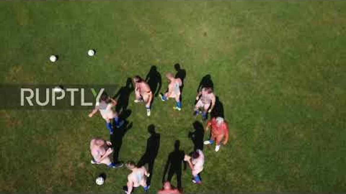 Germany: Football players go butt-naked in artist protest *EXPLICIT*