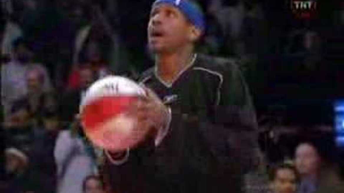 Andre Iguodala behind the glass from AI to reverse dunk