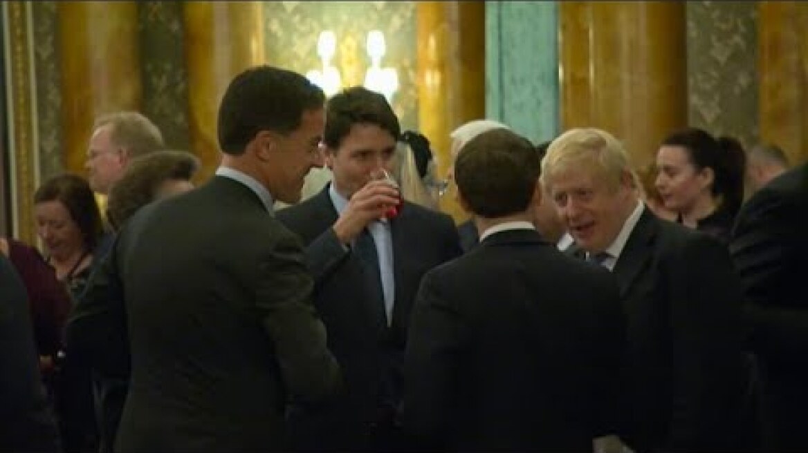 Watch Trudeau, Macron and Johnson appear to gossip about Donald Trump on hot mic