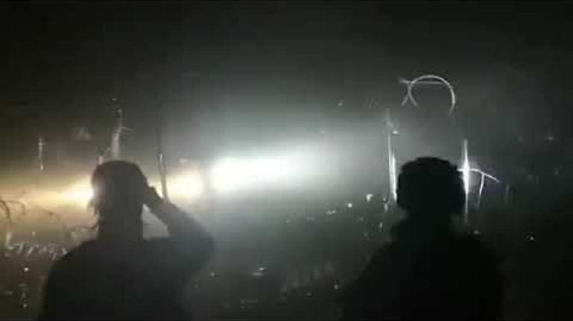 Moment Belarus troops shine strobes and lasers at the Polish army