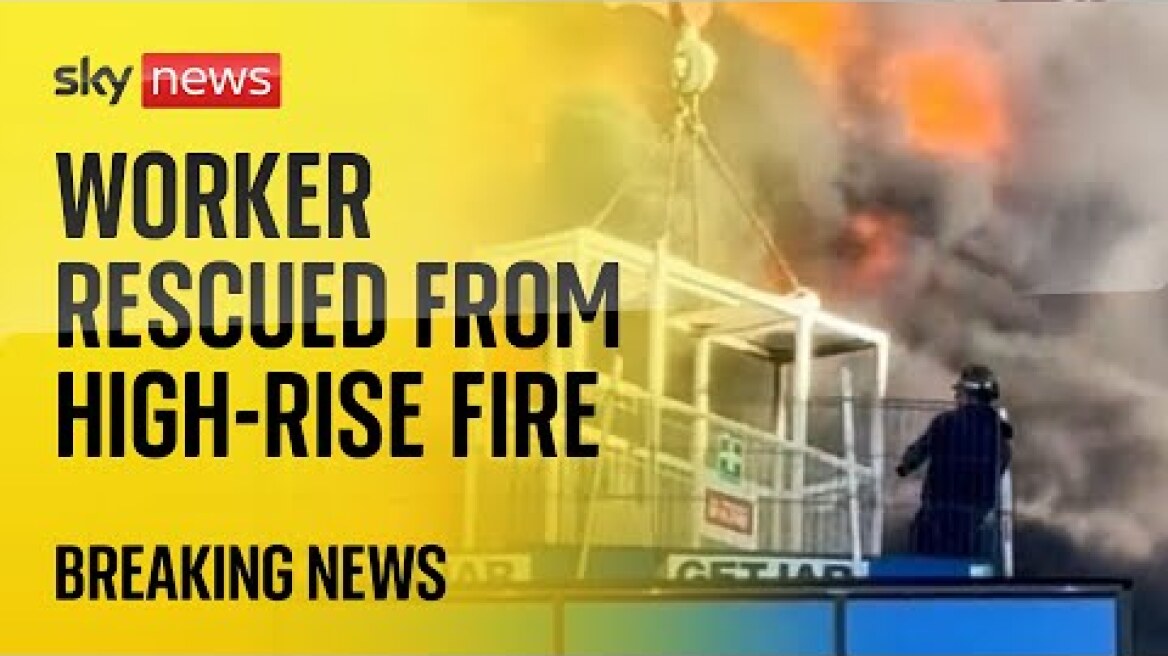 Worker rescued by crane as large fire breaks out at high-rise building in Reading