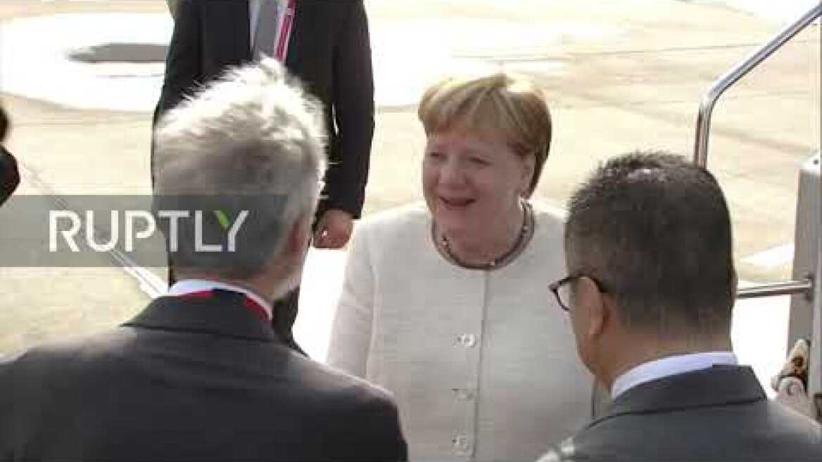 Japan: Merkel arrives in Osaka for G20 summit