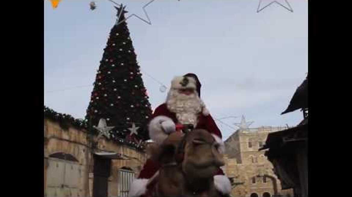 Palestinian Christian Issa Kassissieh Plays Santa in Jerusalem