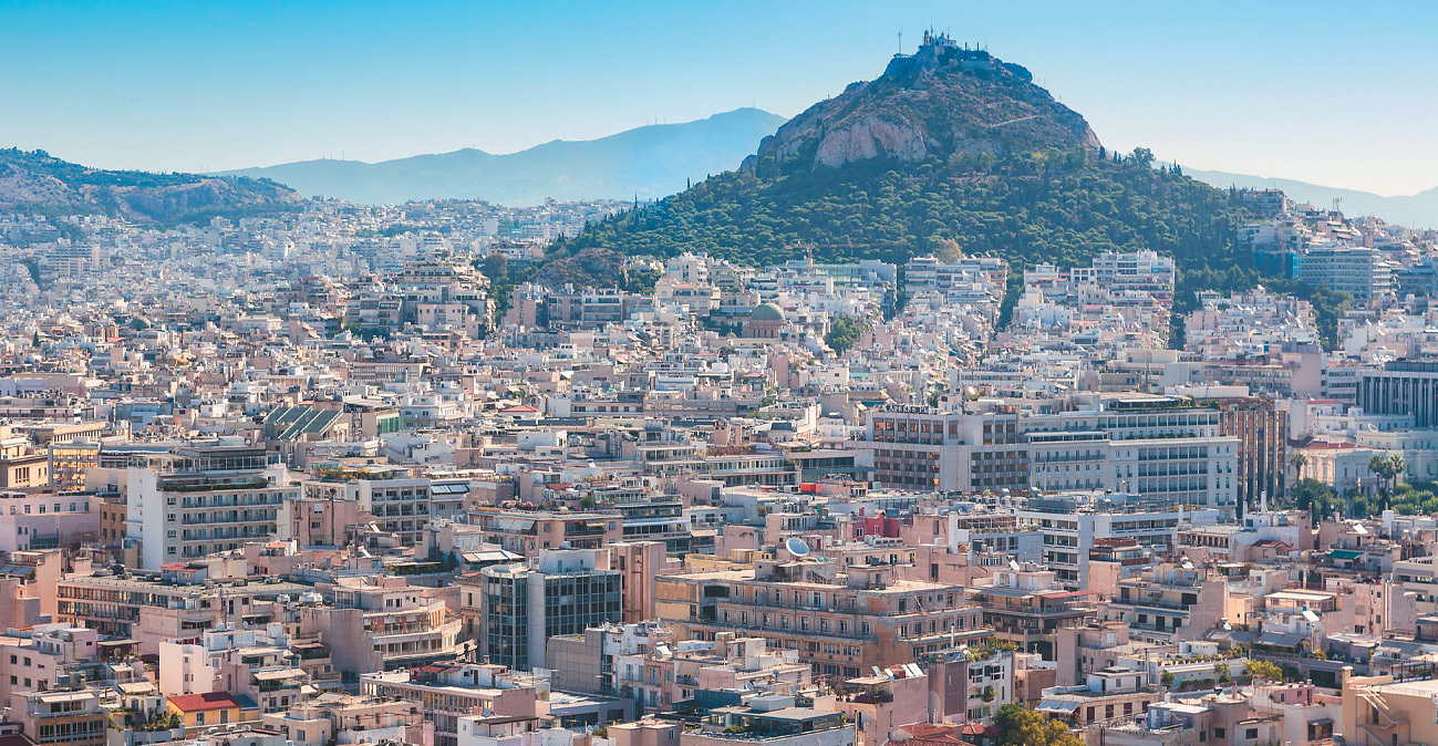 Φταίει ο Καραμανλής; Το «έπος» της αντιπαροχής, πώς η Αθήνα γέμισε πολυκατοικίες