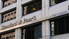 What does the upgrade by Standard & Poor's to a positive outlook for Greek sovereign debt mean