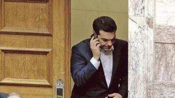 Le Figaro: Άφωνος ο Ολάντ από το τηλεφώνημα Πούτιν για τις δραχμές του Τσίπρα