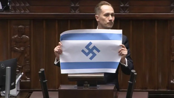 Ακροδεξιός βουλευτής στην Πολωνία ύψωσε μέσα στη Βουλή σημαία του Ισραήλ με μια σβάστικα
