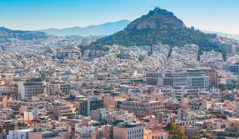 Φταίει ο Καραμανλής; Το «έπος» της αντιπαροχής, πώς η Αθήνα γέμισε πολυκατοικίες