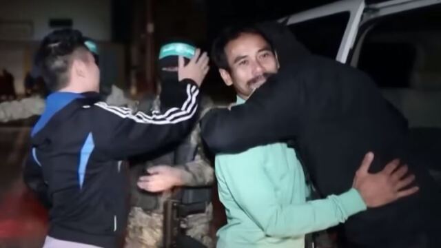 Completely Contrived: Released Israeli detainees hug Hamas goodbye