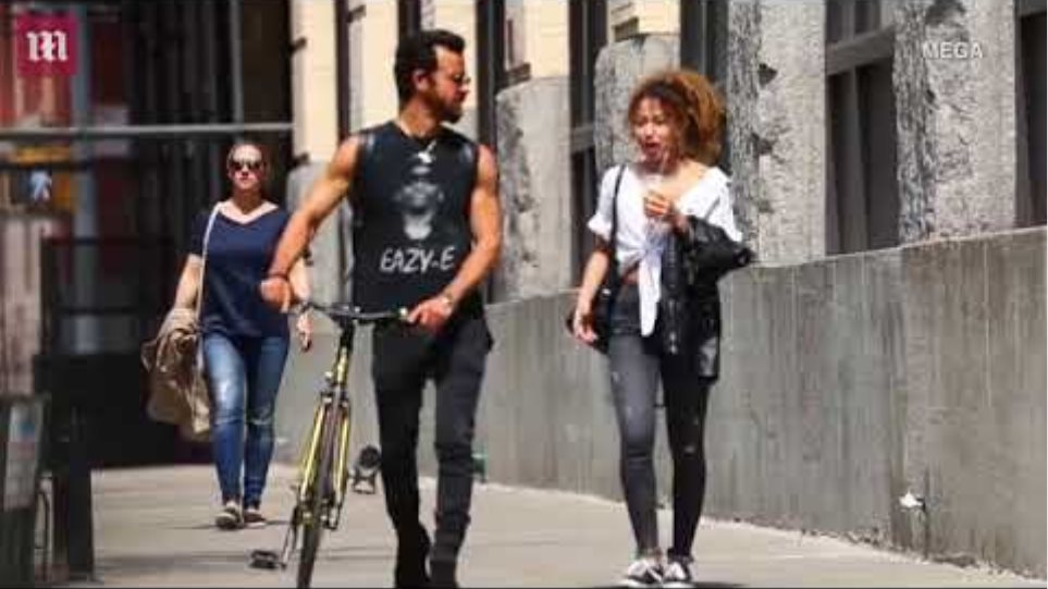 Justin Theroux spotted chatting to a mysterious lady friend in NYC