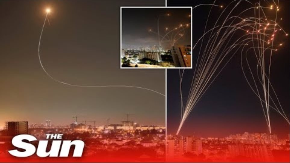 Israel's Iron Dome defence intercepts scores of Gaza rockets in skies above Tel Aviv