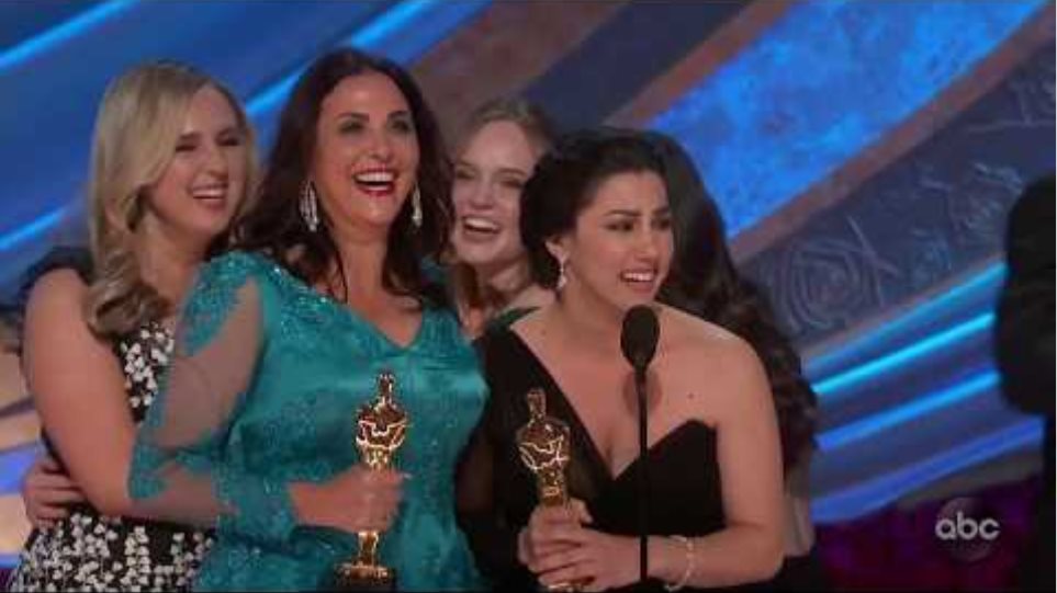 PERIOD. END OF SENTENCE Accepts the Oscar for Documentary (Short Subject)