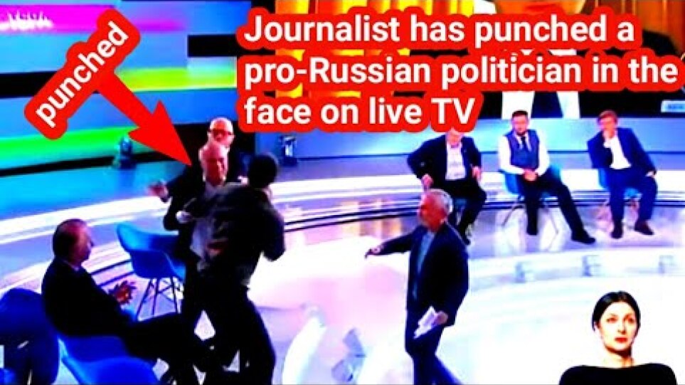 journalist has punched a pro-Russian politician in the face on live TV in Ukraine