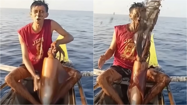 Γιγαντιαίο καλαμάρι εκδικήθηκε ψαρά - Τον έλουσε με μελάνι μόλις το έβγαλε από τη θάλασσα, δείτε το viral βίντεο